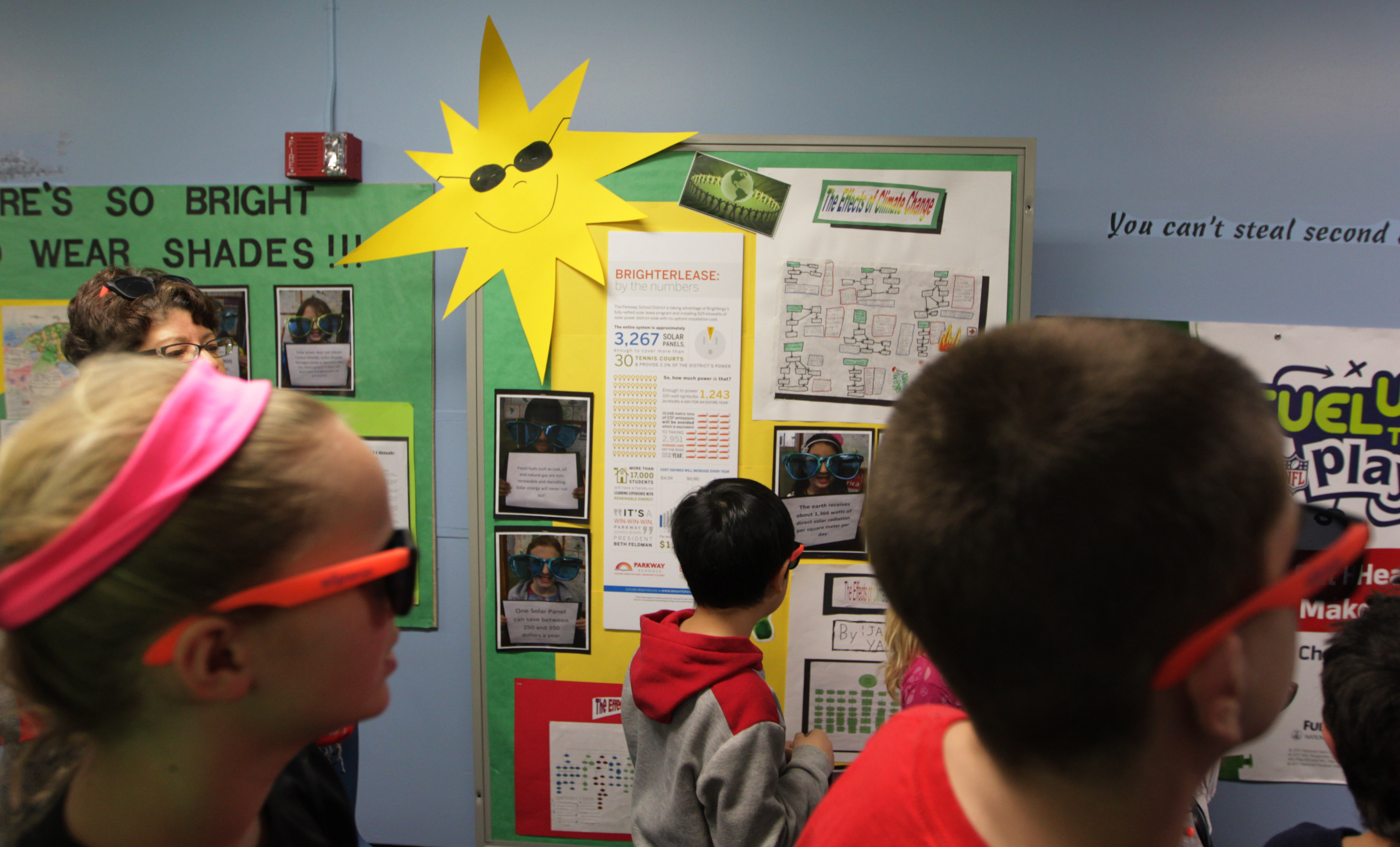 Solar energy and schools pair perfectly together. Here, students in the Parkway School District are ready for their school's Solar Dedication event.