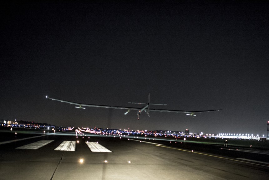 The Solar Impulse - the first solar plane to be able to fly night and day - descending onto the runway at Lambert - St. Louis. 