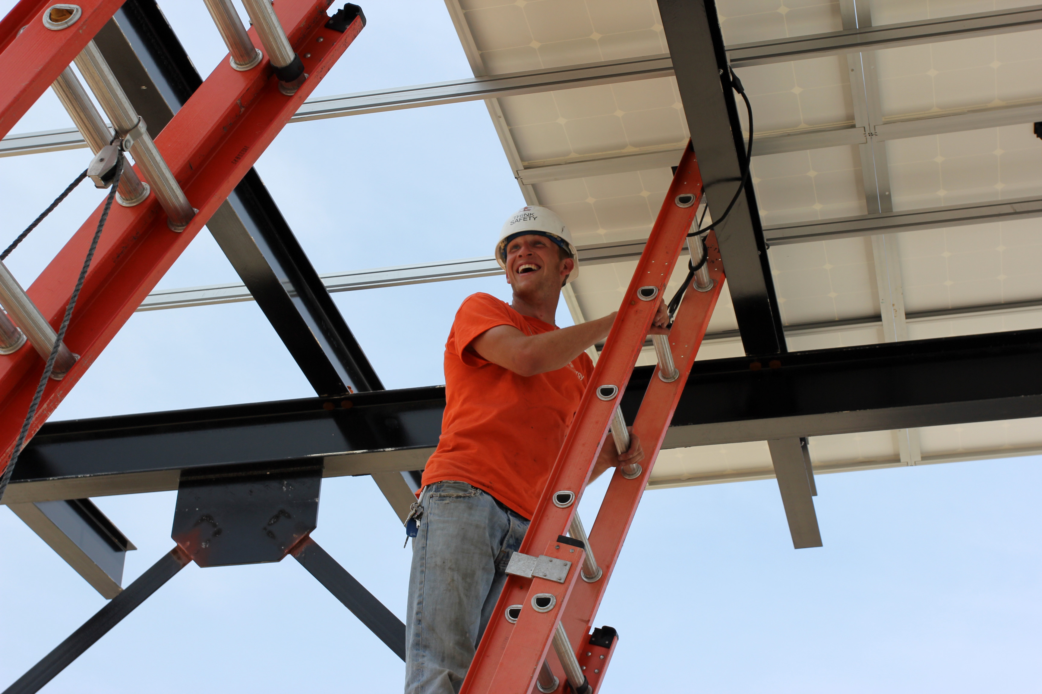 Brightergy Solar Installer Paul Rector at work on the Spencer Parsons solar canopy i