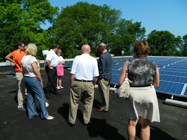 Summer Solstice attendees took tours of Norwood Hills' solar array on their club roof.