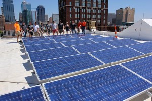 Brightergy team members installing a solar array on top of our headquarters in downtown Kansas City