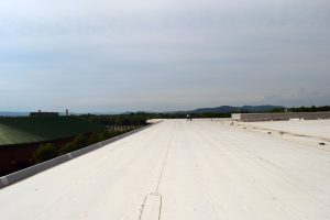 the UMass Amherst Rec Center roof is empty here but the site of a future solar array