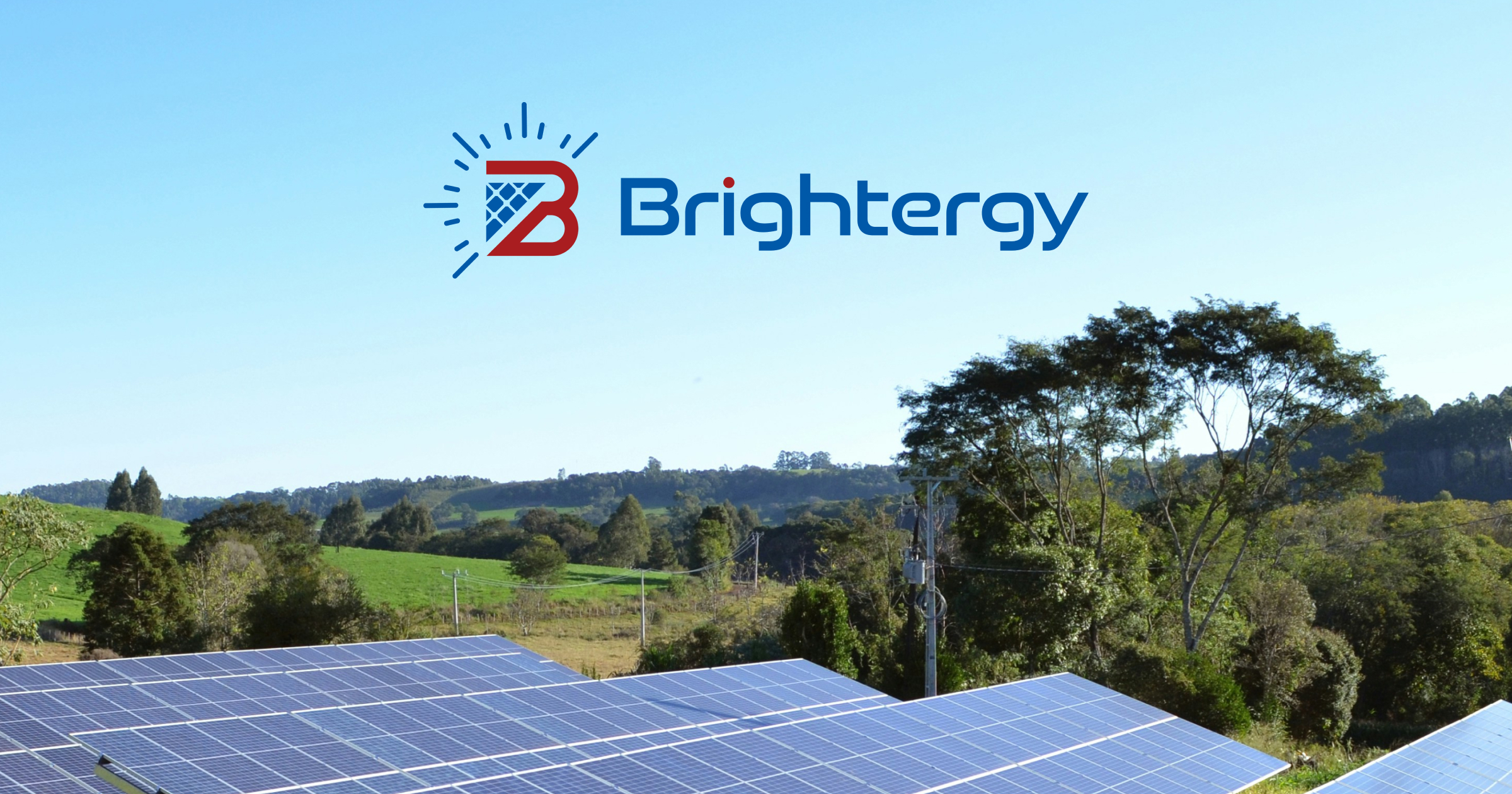 Rows of solar panels in a rural landscape beneath a clear sky, with the Brightergy logo and text above. Perfect for blogs on solar energy, this scene highlights sustainable innovation in action.